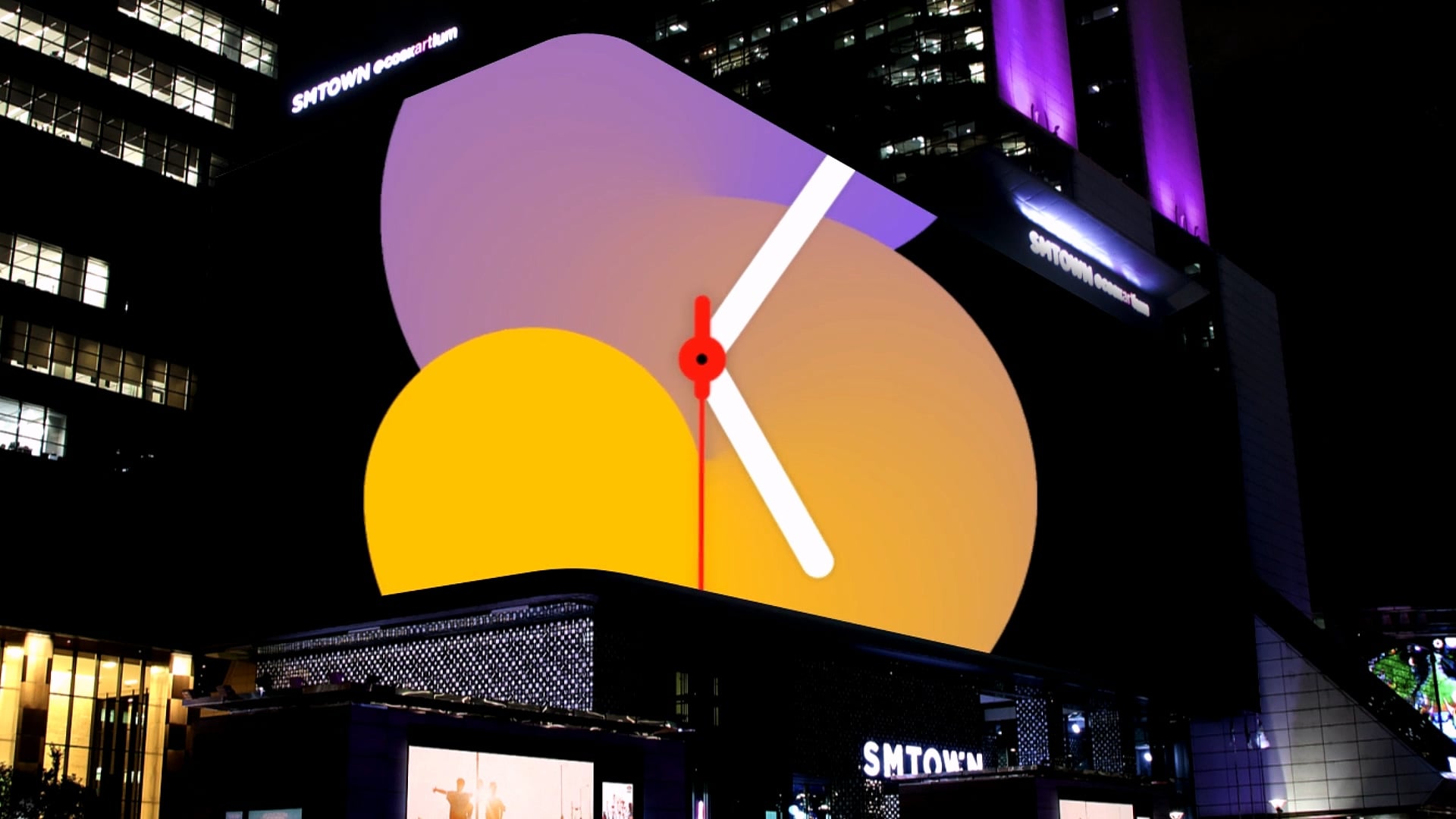 The watch face filling the corner display