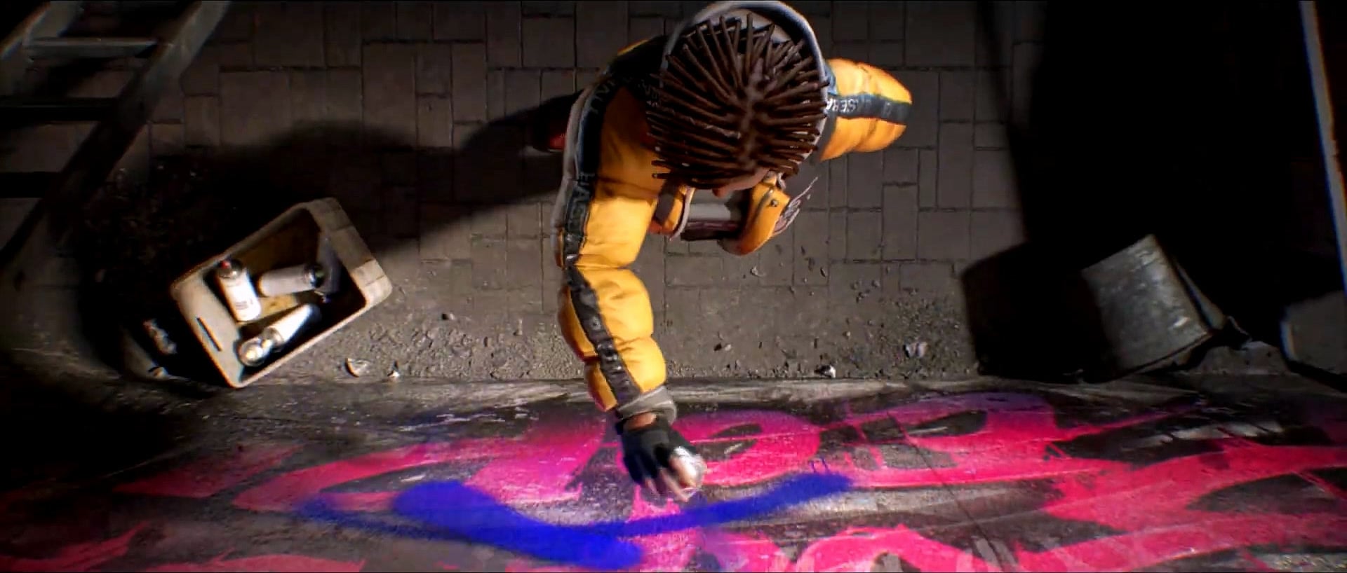 Overhead view of a character in a yellow jacket spraying paint on the floor.