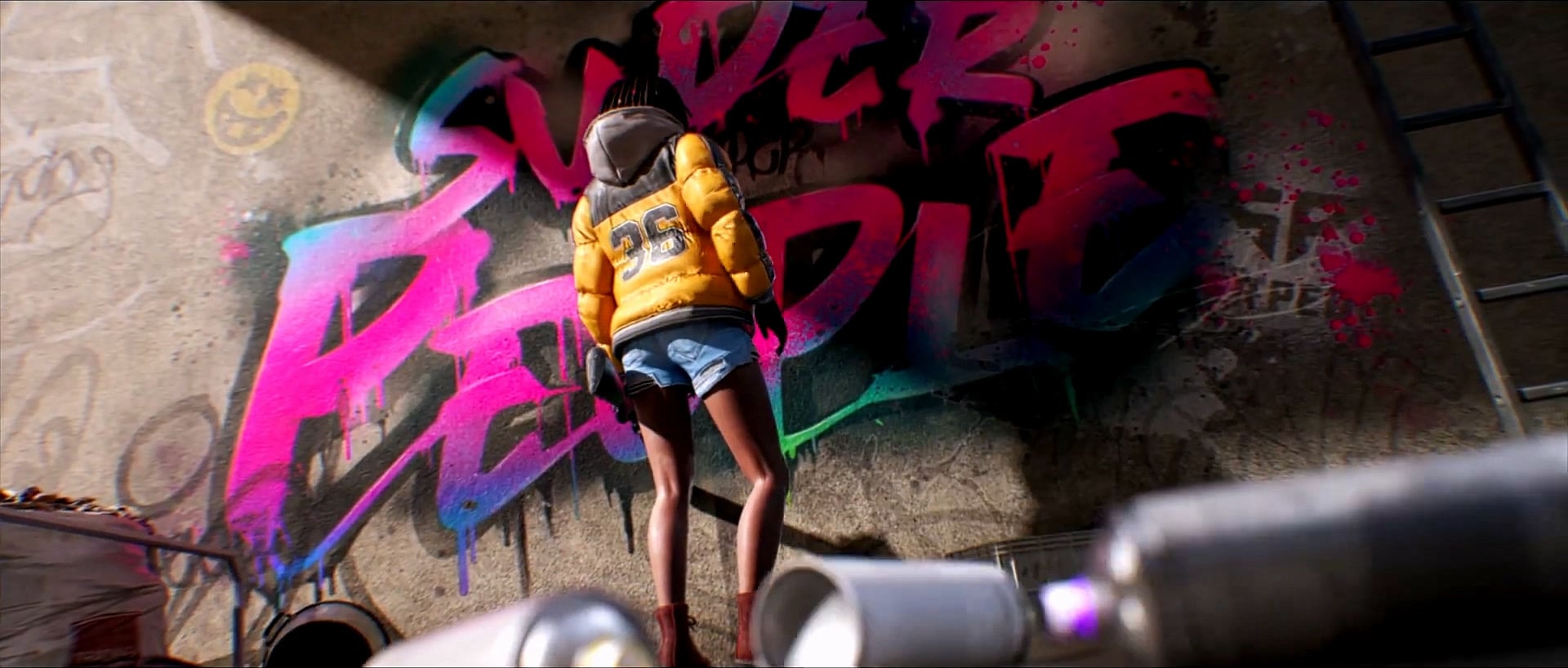 A character in a yellow jacket in front of a pink graffiti wall.