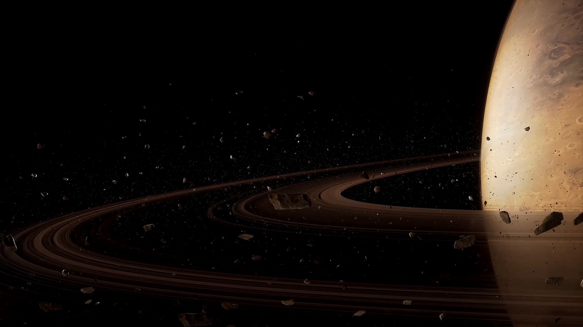 A ringed planet with drifting rocks against black space.